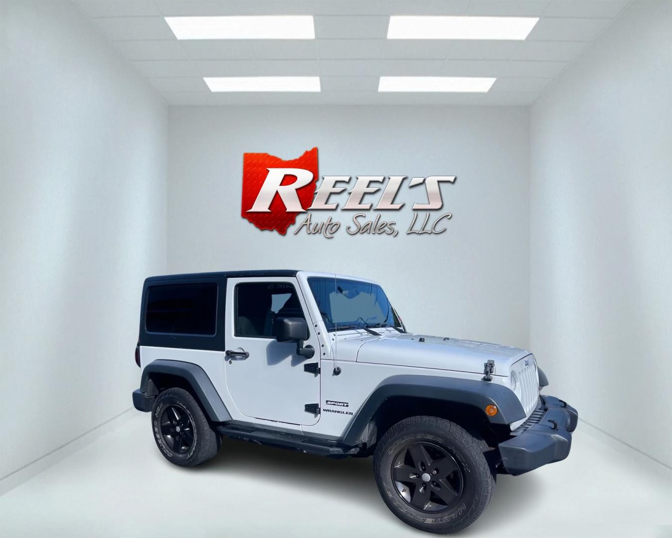 2013 White /Black Jeep Wrangler Sport 4WD (1C4AJWAG7DL) with an 3.6L V6 DOHC 24V engine, 6 Speed Manual transmission, located at 11115 Chardon Rd. , Chardon, OH, 44024, (440) 214-9705, 41.580246, -81.241943 - Photo#3